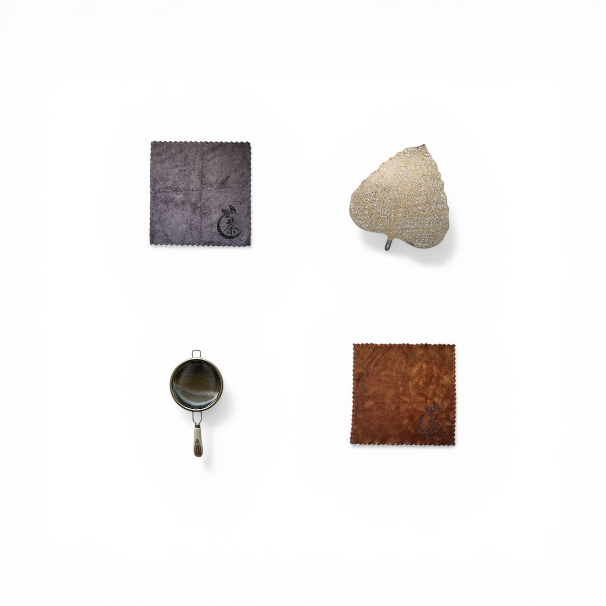 Set d’accessoires THÉCHA avec filtres, feuille décorative et chiffons d’entretien, ensemble raffiné pour la préparation des infusions.